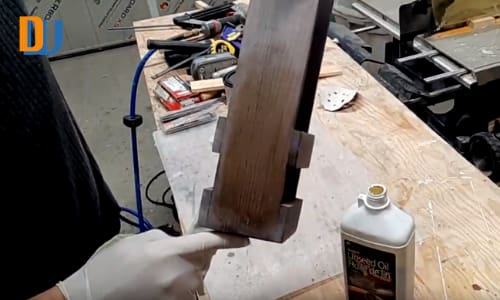 linseed oil application on wood for wine bottle carrier