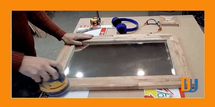 Final sanding of wood for mirror frame (1)